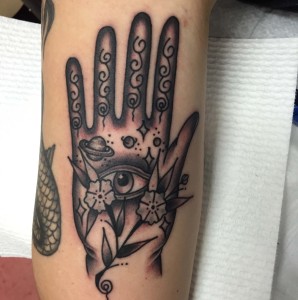 Spiritual hand tattoo